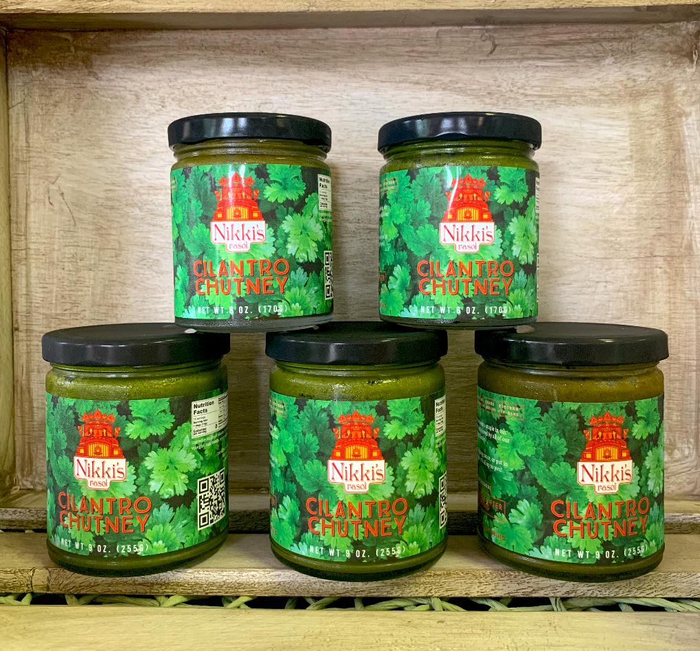 Six and nine ounce jars of our cilantro chutney on display.